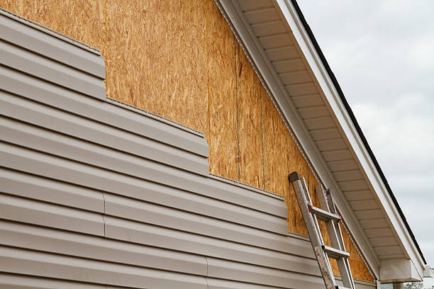 Professional Siding technician working in Tewksbury, MA